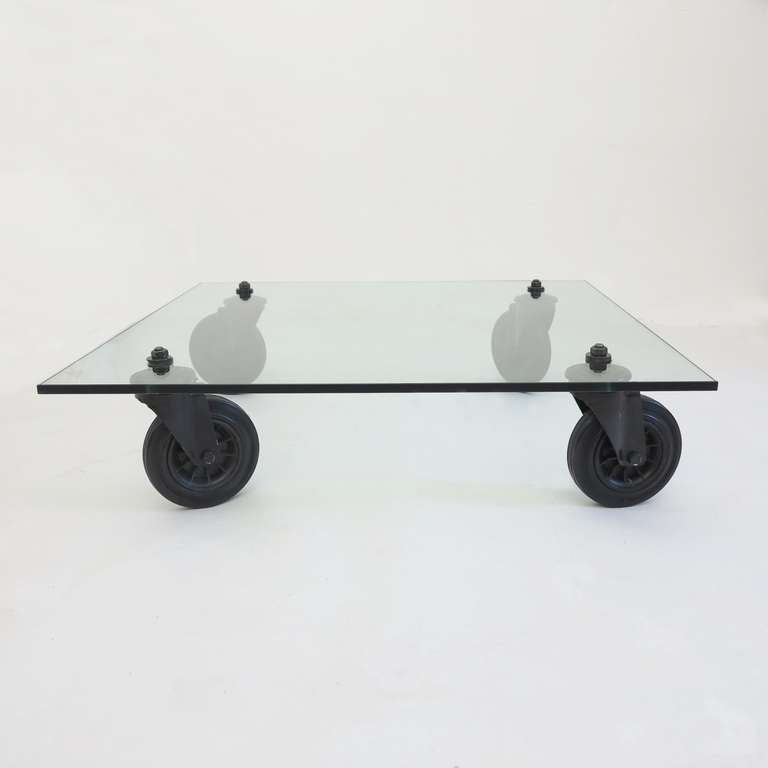 Glass table on wheels by Gae Aulenti (1927 - 2012).

Original 