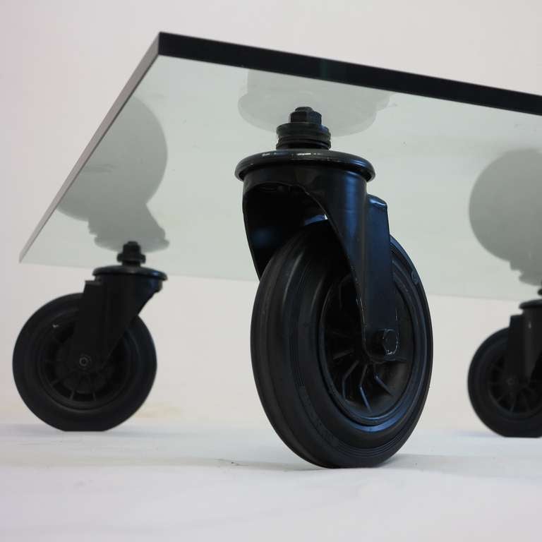 Mid-Century Modern Gae Aulenti Design Glass Table on Wheels 1980 For Sale