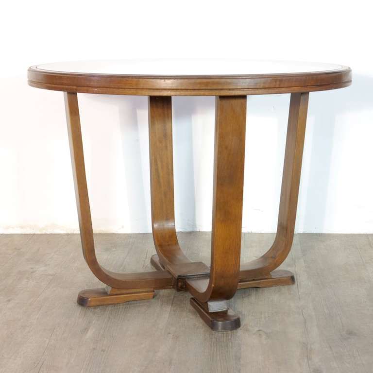 Art Deco coffee table with wood base and black glass top.

Year: Germany 1930 - 1935.

Measure: Height 60 cm (23.62 inch). Diameter 80 cm (31.5 inch)

Condition: Good.

Shipping is not included in price.

Shipping worldwide, please