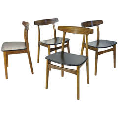 Set of four Henning Kjærnulf dining chairs for Bruno Hansen. Denmark 1955