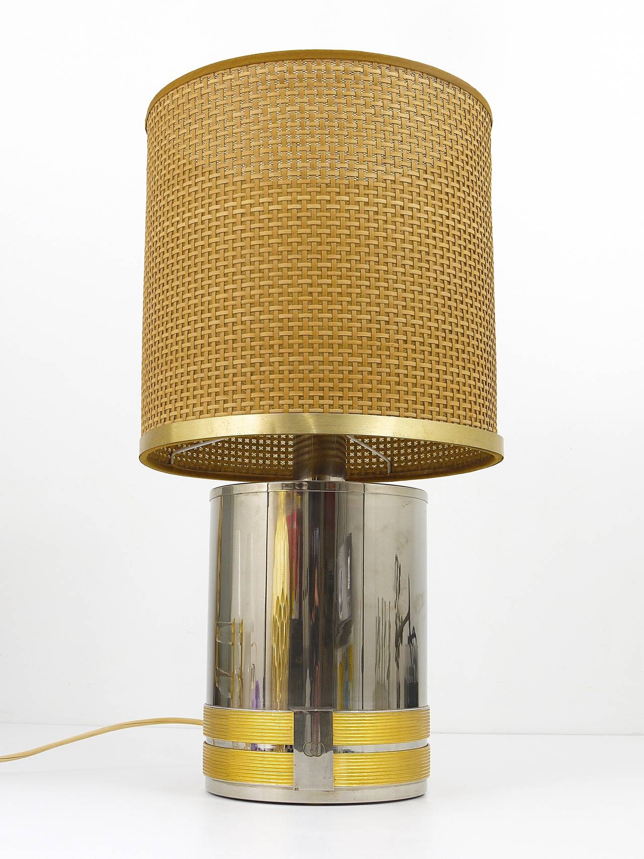 An outstanding lamp, designed and executed by Gucci Italy. A stylish piece, with a chrome-plated base with nice gold-plated details and an embossed Gucci logo.Has a beautiful 