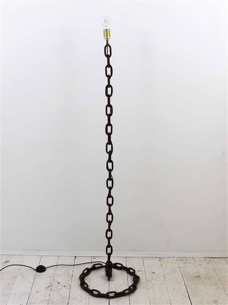 Beautiful French nautical floor lamp from the 1970s, made of an iron chain, with  nice patina. In the manner of Franz West. Good craftsmanship. Measurements: Height 60 inches. A very unusual piece.