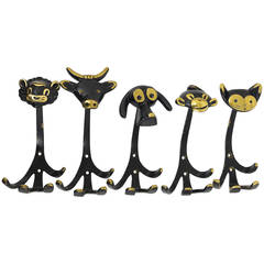 Five Walter Bosse Brass Wall Hooks of a Lion, Cow, Dog, Monkey, and Cat, Vienna