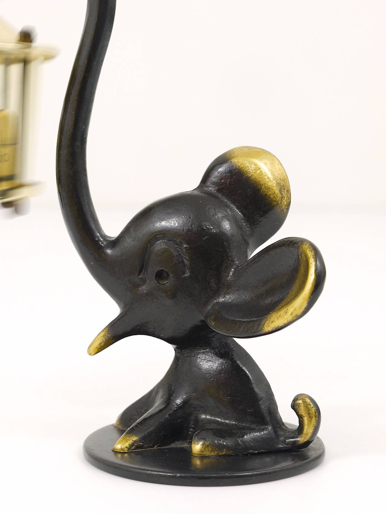 A very charming Austrian desk thermometer, consisting of a nice elephant figurine and a lantern-shaped thermometer. A very humorous design by Walter Bosse, executed by Hertha Baller Austria in the 1950s. Made of brass, in excellent condition.