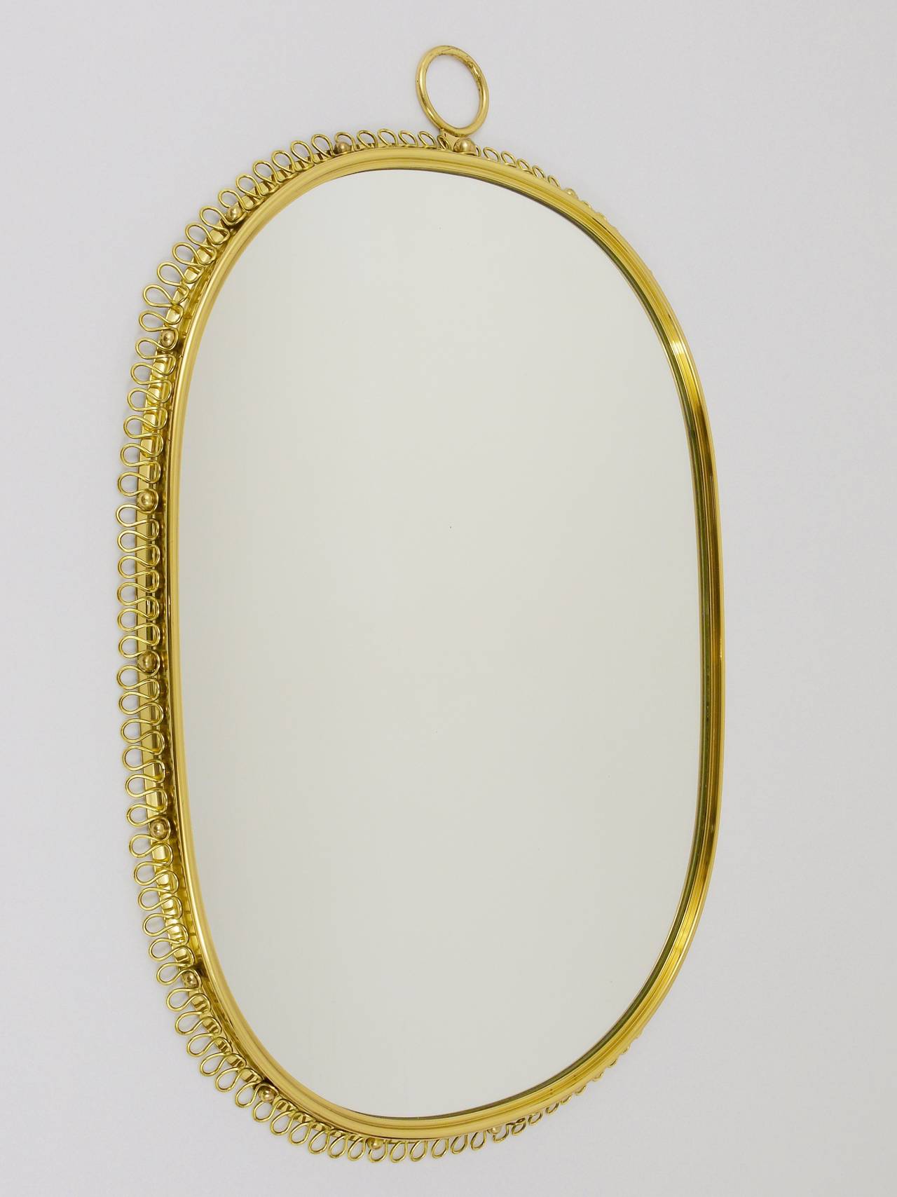 brass metal loop mirror