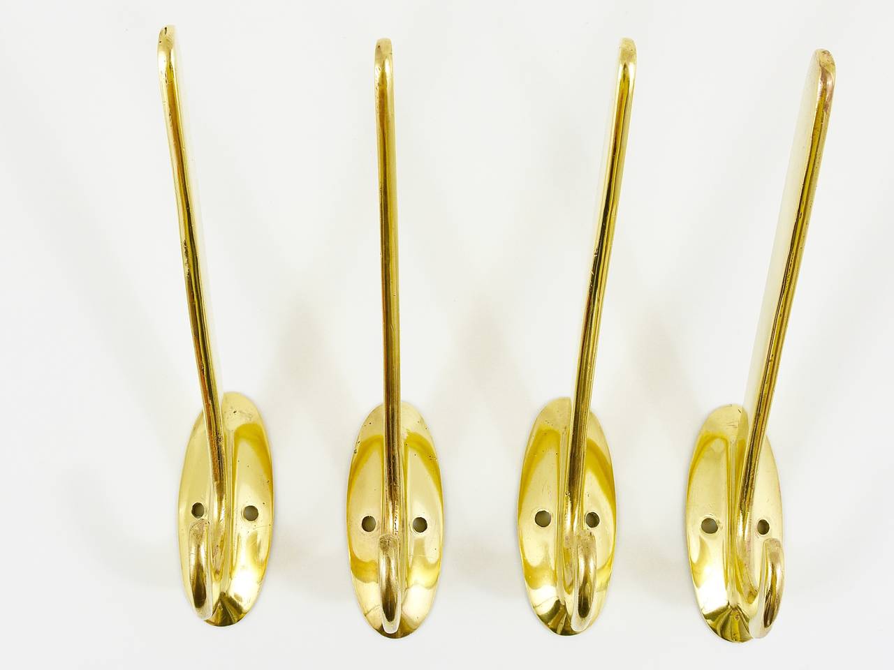 Four Art Nouveau Handmade Brass Wall Hooks, Austria, 1920s In Good Condition For Sale In Vienna, AT