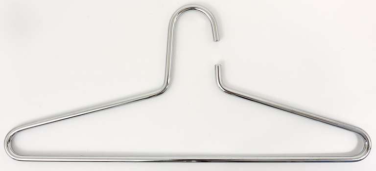 Set of 6 beautiful chrome-plated hangers, designed an executed by Carl Aubock, Vienna, in the 1970s. Very solid and stylish pieces in excellent condition. 16 1/2