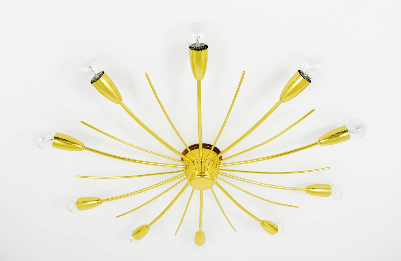 A beautiful and large Midcentury sputnik chandelier ceiling lamp from the 1950s, model „Sonne