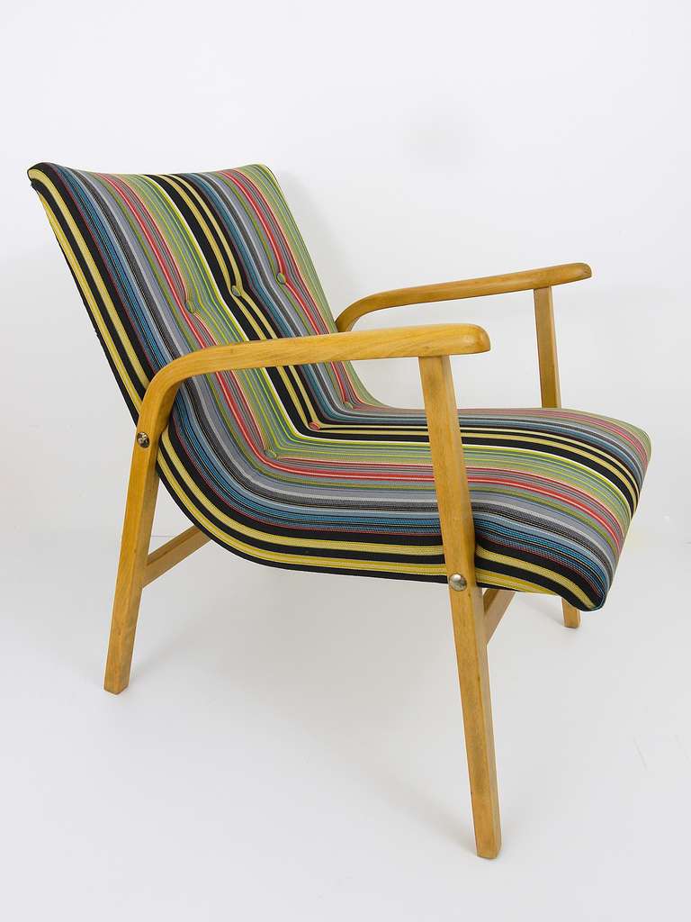 A beautiful Viennese modernist chair, designed by Roland Rainer for the well known Café Ritter in 1952. In excellent condition, gently restored and reupholstered with exclusive original Paul Smith fabric by Maharam NY. An eye-catching chair. 4