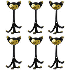 Up to Eight Walter Bosse Brass Animal Wall Hooks Displaying a Cat Austria, 1950s