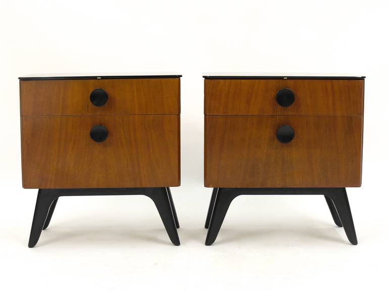 A beautiful pair of Art Deco bedside tables with black glass top, designed and executed by Jindrich Halabala in the 1930s. In very good condition. A fine example of Art Deco design.