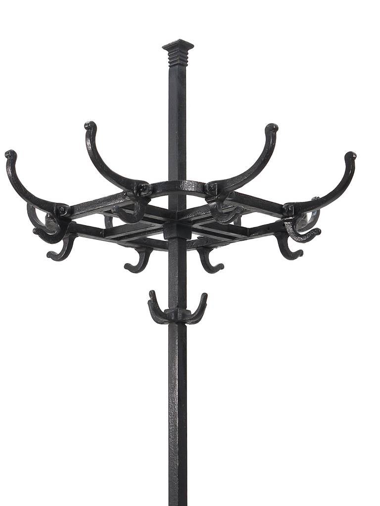 A beautiful Art Nouveau coat stand designed in 1913 by Adolf Loos for the Viennese Café Capua. Made of black finished cast-iron with swivel top. In excellent condition.
