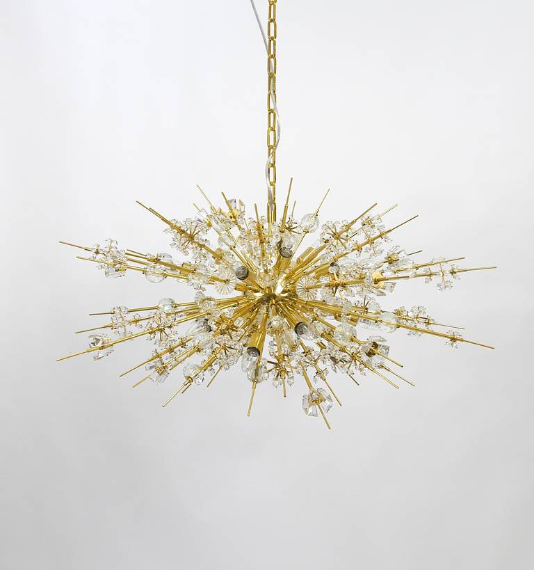 A very impressive and big Miraculoso Sputnik chandelier, executed by Bakalowits, Vienna in the 1970s. Made of gold-plated brass, with many spokes fully covered with different glass crystals. Carefully restored and rewired, in excellent condition.