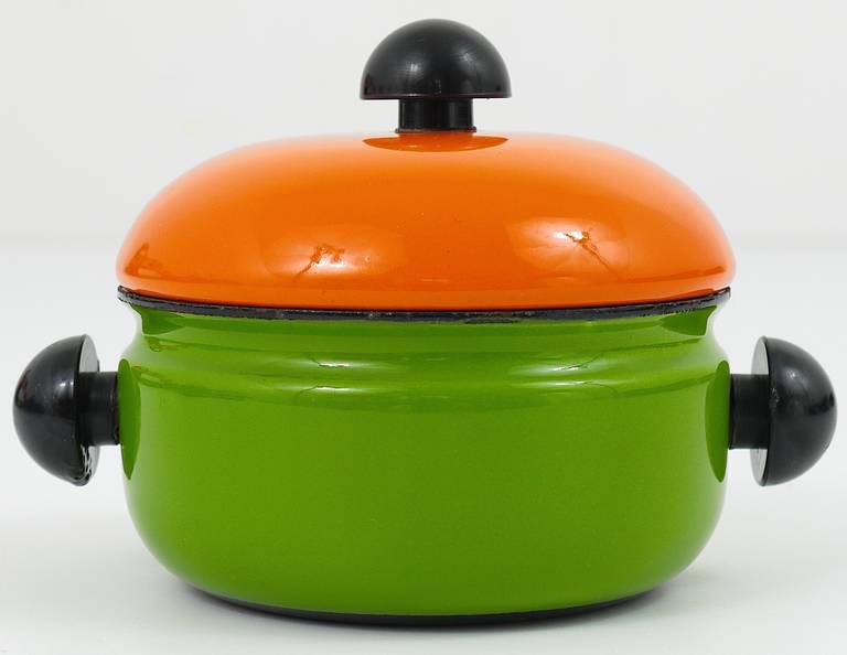 A very beautiful enameled pot with lid,
designed by Carl Auböck, Vienna.
Executed by Riess/Austria, 1970s.
Diameter without handles 4 in
Orange and green, white interior.
Excellent condition, unused

We are offering many other Carl Auböck pans and