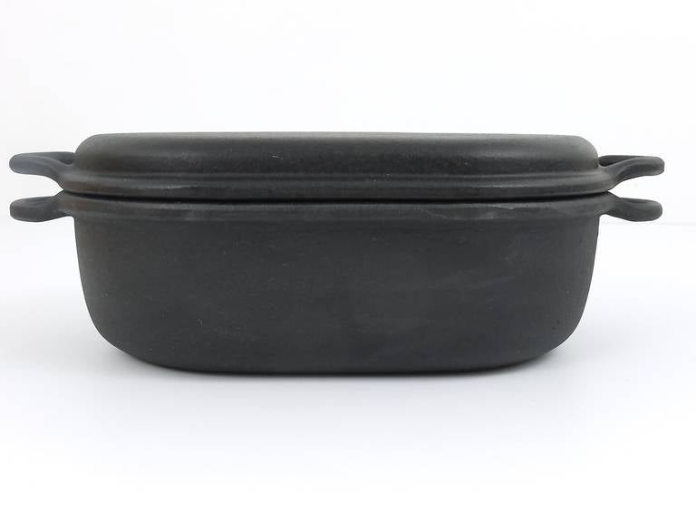 A very beautiful oval cast iron pot with lid, very solid
designed by Carl Auböck Vienna,
executed by Ostovics/Vienna, 1970s.
14 x 9 in
excellent condition, unused in original box.

We are offering many other Carl Auböck cookware, pans and pots in
