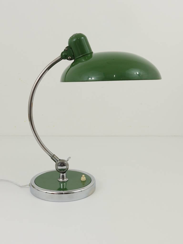 A very beautiful green German Bauhaus desk lamp, model 6631 Luxus, designed by Christian Dell in the 1930s, executed by Kaiser. Unrestored and original, but in very good condition with marginal patina. A beautiful table lamp, nice color.