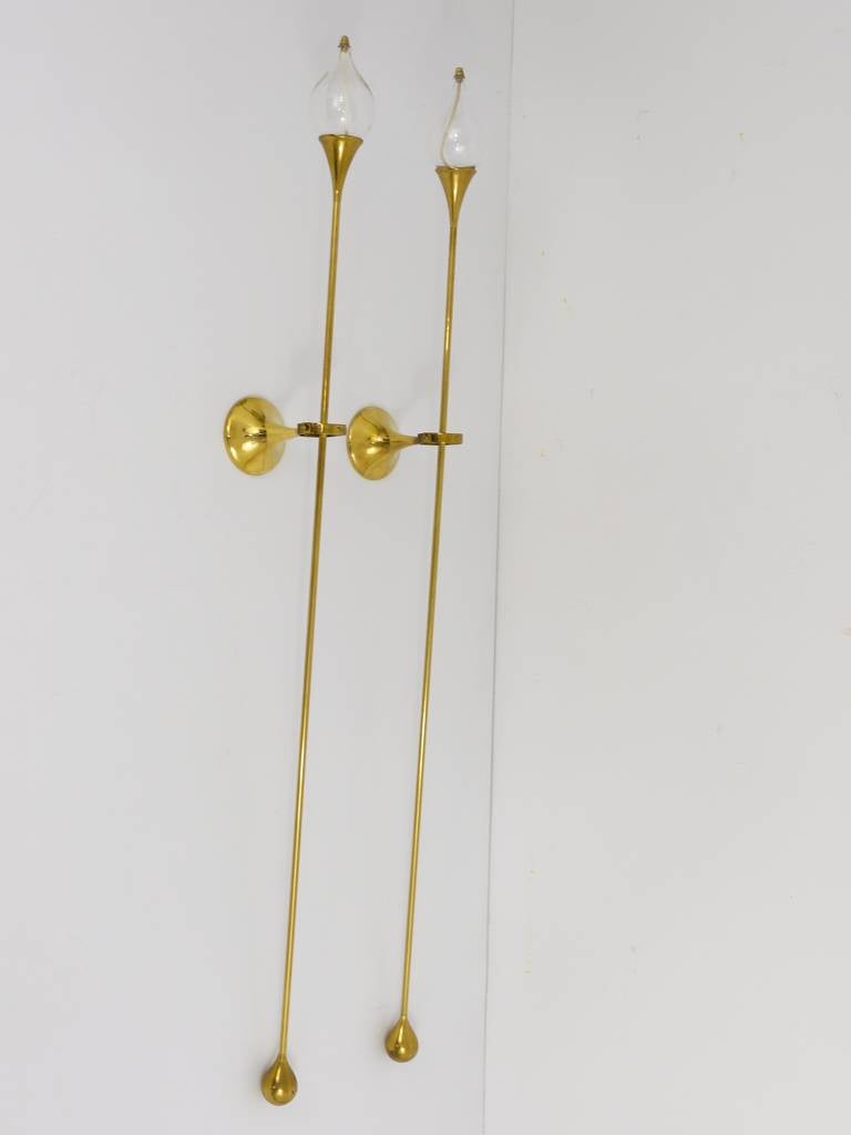 A very beautiful pair of long brass wall candle holders for two glass oil candles. Designed by Freddie Andersen, made in Denmark in the 1970s. Excellent condition. We offer a matching chandelier in our other listings. 39