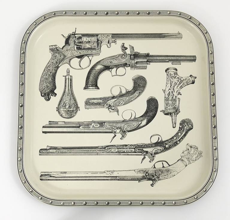 A very beautiful serving tray, made of metal, with nice pistol pattern. From the 1960s, unmarked, attributed to Piero Fornasetti, Italy. Excellent condition, 13x13