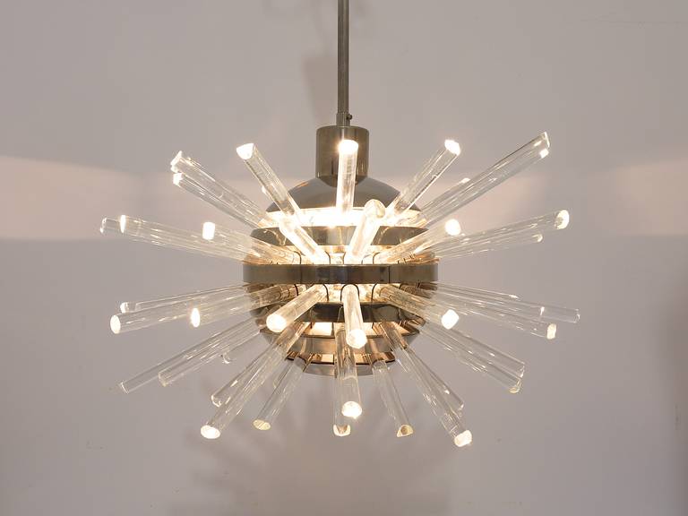 Beautiful Austrian radiant Mid-Century Miracle chandelier, designed by Prof. Friedl Bakalowits and crafted by Bakalowits & Söhne, Vienna, Austria in the 1960s. This stunning piece features a nickel-plated brass frame adorned with clear crystal glass