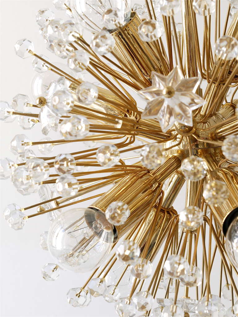 Magnificent snowflake blowball sputnik chandelier from the 1970s, designed by Emil Stejnar. Exclusive gold-plated model. Made in Vienna, Austria by Rupert Nikoll. Has a diameter of 12 in/30cm, its total height incl. rod is 28 in;/70cm. It offers 11
