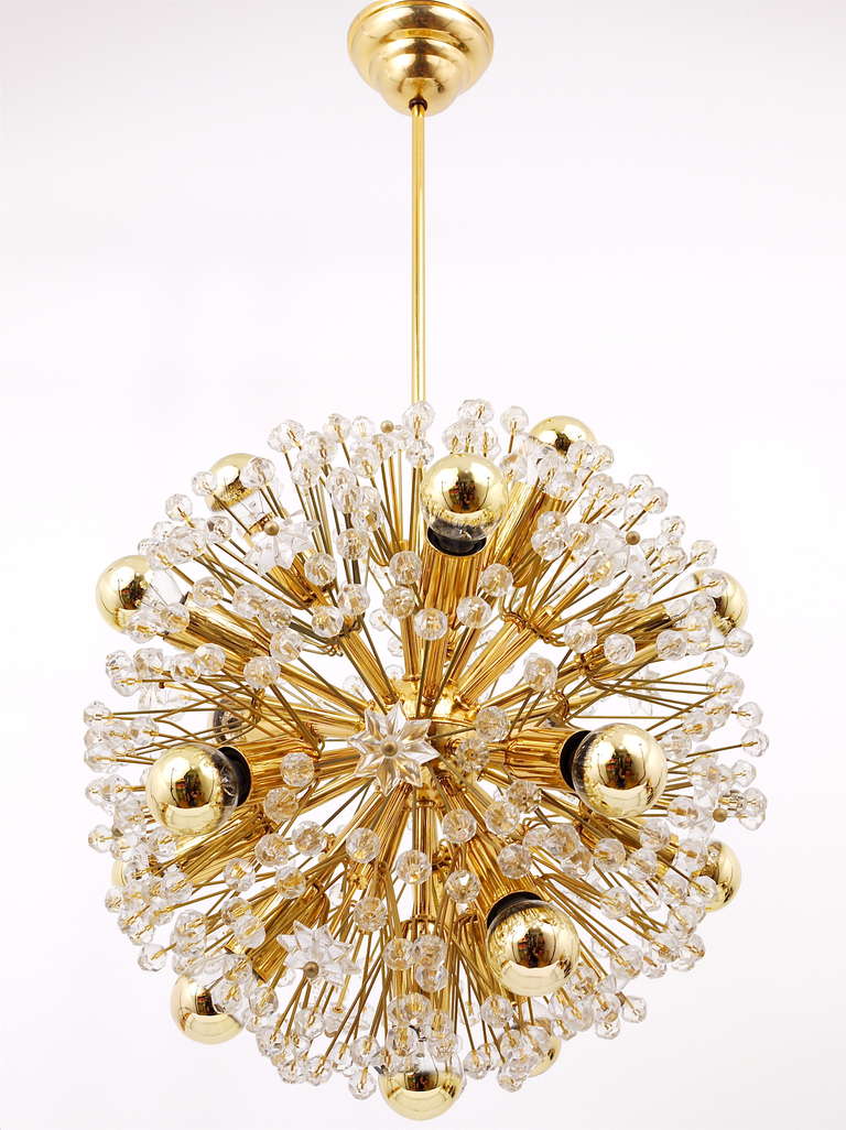 Magnificent Viennese snowflake blowball sputnik chandelier. Exclusive 24 carat gold-plated model. Designed by Emil Stejnar, executed by the Viennese manufacturer Rupert Nikoll. Has a diameter of 15