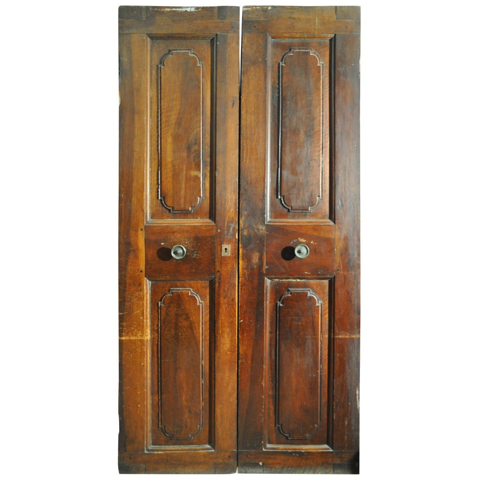 A Very Fine Italian Walnut Door, 17th Century For Sale