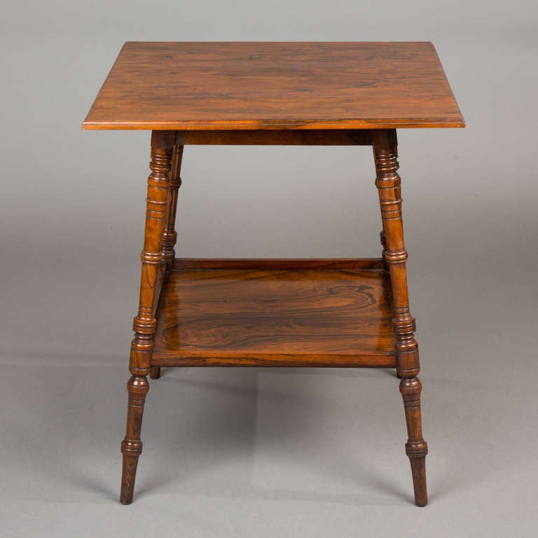 A 19th century rosewood occasional table by Wylie and Lochhead of Glasgow, circa 1870. The square top with moulded edge raised on ring tapering legs united by a solid undertier, maker's name stamped twice on underside of one berer and stamped 87427