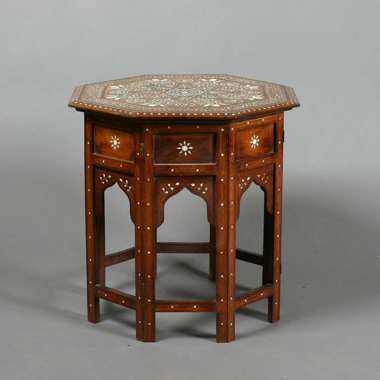 An Anglo-Indian hardwood and ivory marquetry octagonal occasional table. Early 20th century.