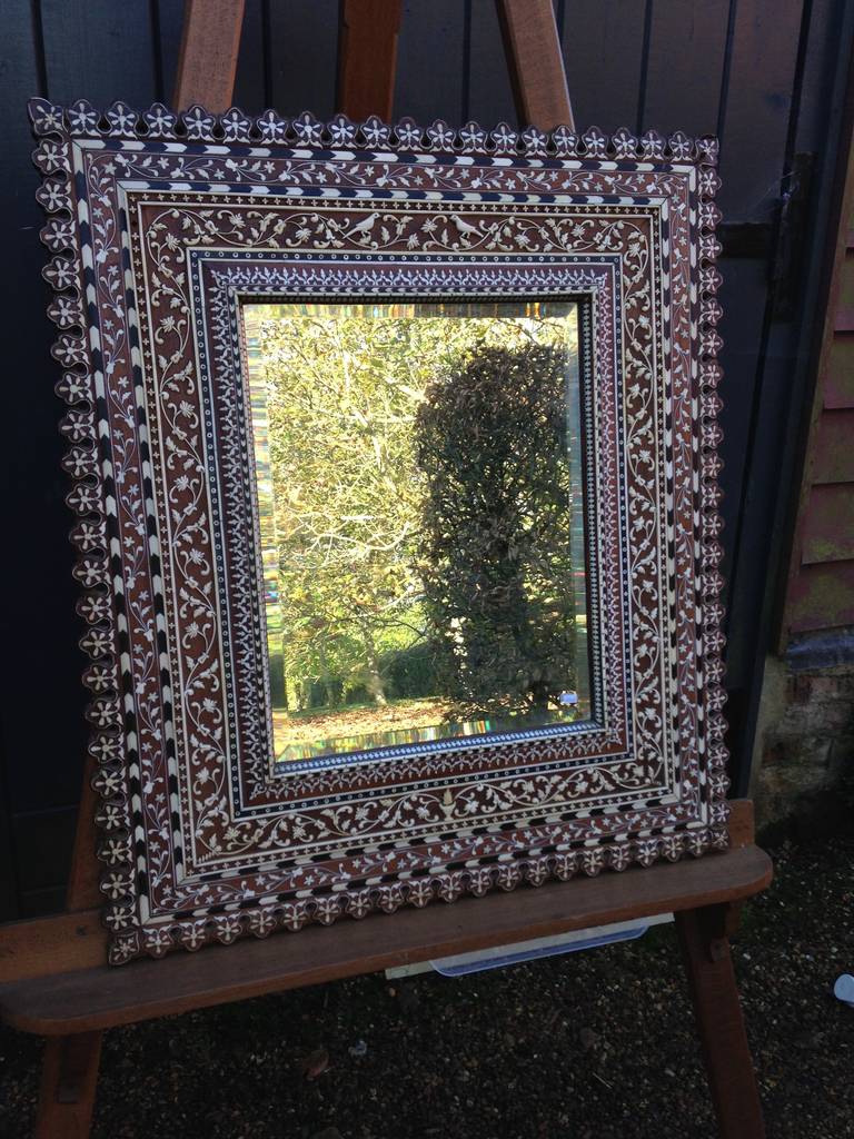 A rectangular Anglo Indian inlaid mirror with bevelled glass, circa 1900