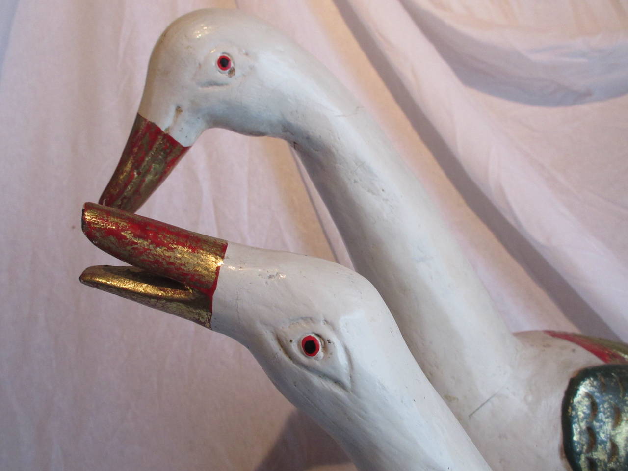 Rare pair of attractive Dutch Folk Art wooden decoy goose, polychrome painted cream coloured and gold.