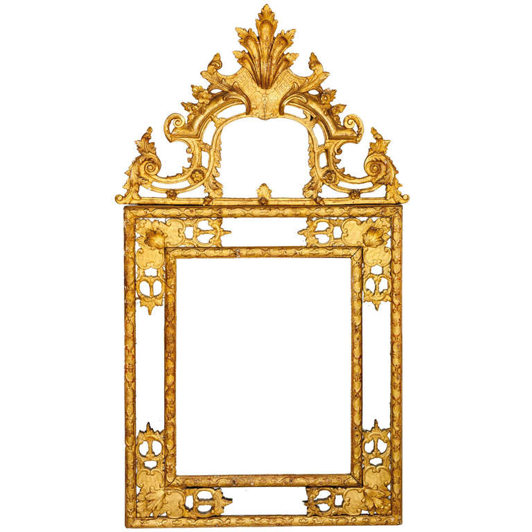 An unusual size Regence gilt-wood mirror, circa 1720-30