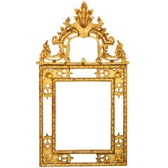 An unusual size Regence gilt-wood mirror, circa 1720-30