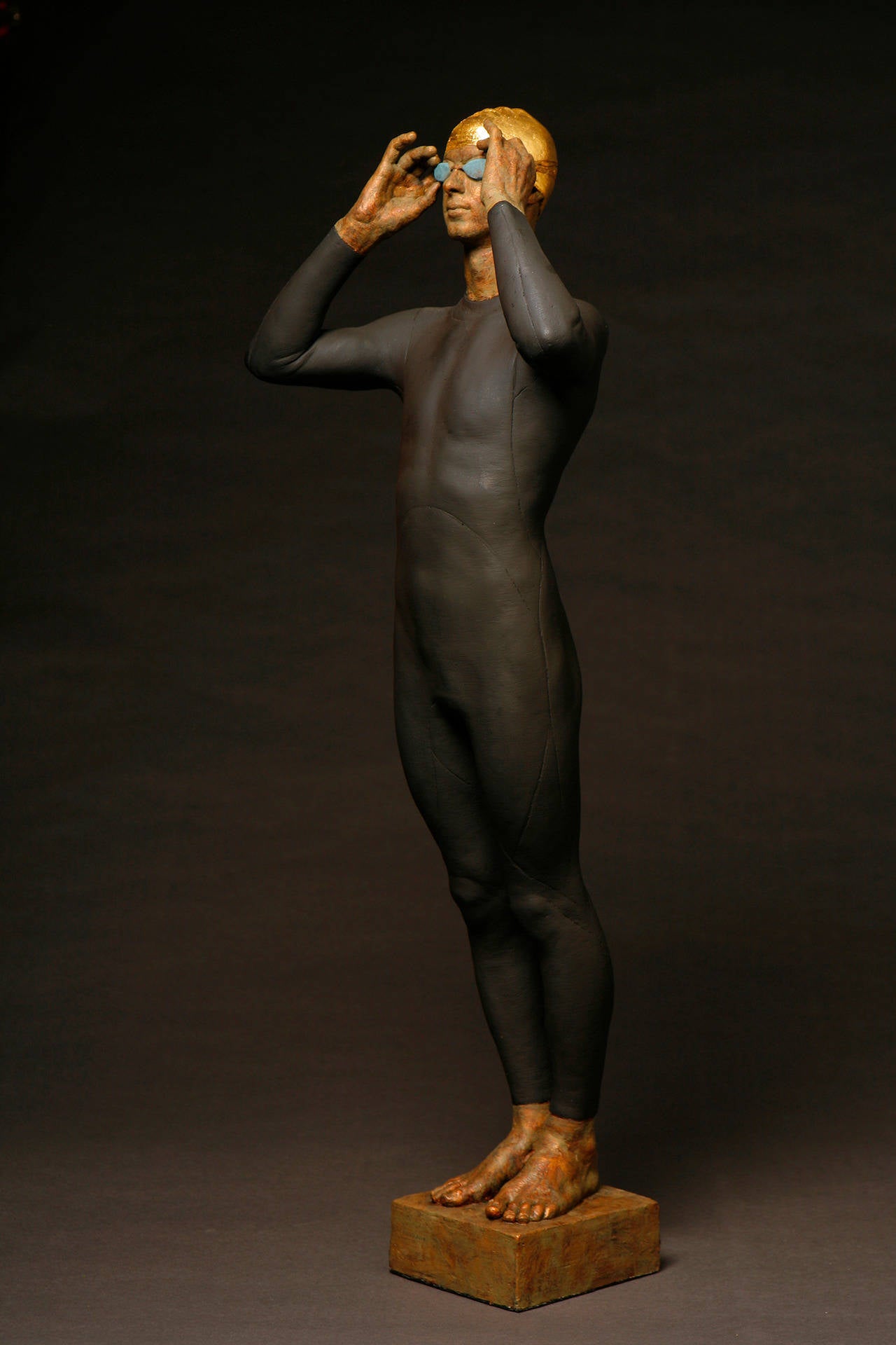 Swimmer or triathlete sculpture in bronze.
Dimensions: 34 x 4 1/2 x 5 1/2 in.

Sculptor Deon Duncan received her MFA from The School of the Art Institute in Chicago. She worked in inner-city Chicago with 