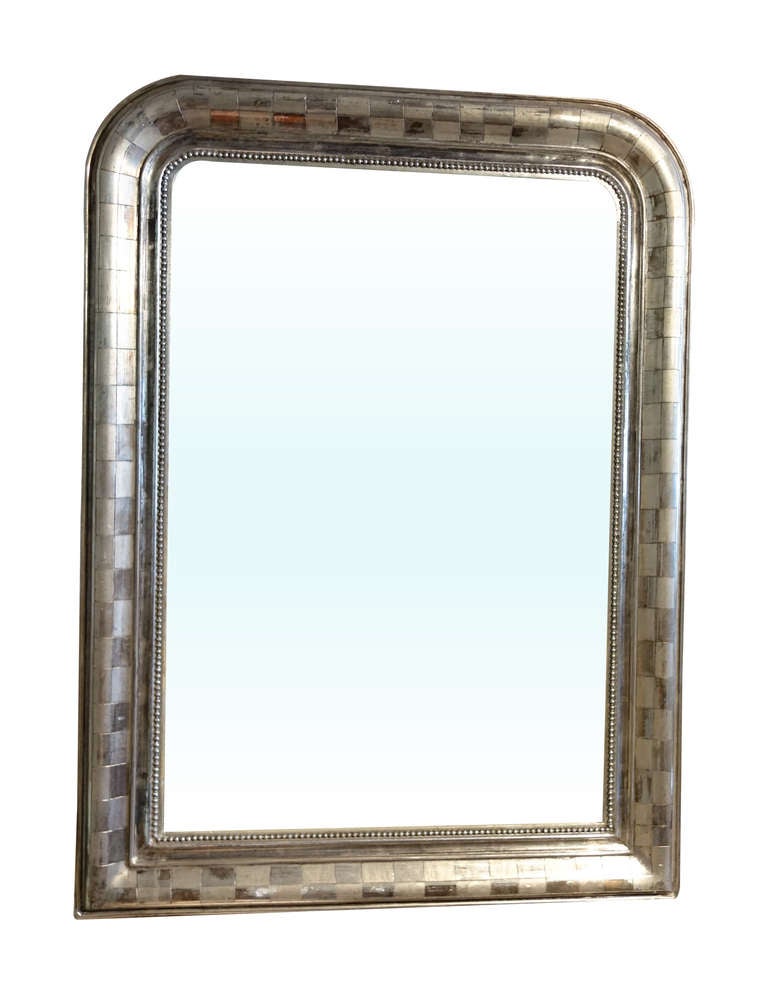 Pair of silver gilt mirrors, one slightly larger than the other:
40