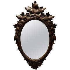 Antique Black Forest Carved Oval Mirror