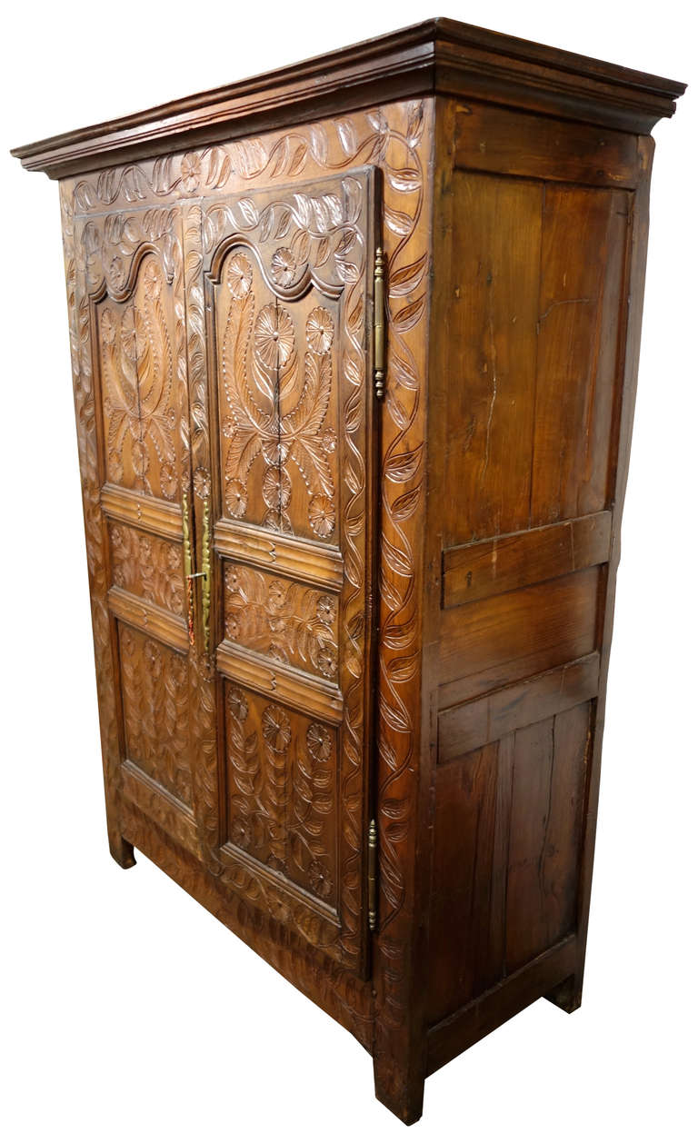 Folk Art Early 19th Century French Armoire with Folky Elaborate Carvings