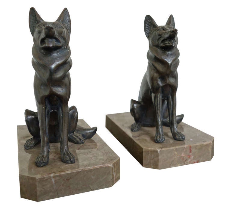 Pair of Art Deco spelter and marble dog bookends. Very stylized.