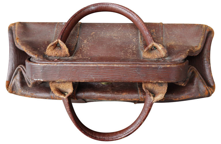 Fabulous Turn of the Century Leather Carry All Bag with Skull and Cross Bones