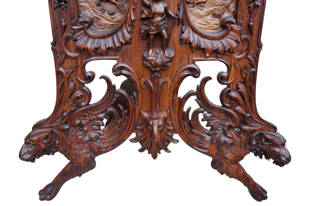 Monumental continental Black Forest style carved fire screen. Truly unique example of fine carving.