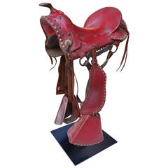 Folky Red Leather Childs Saddle on Stand Sculpture, 1920s