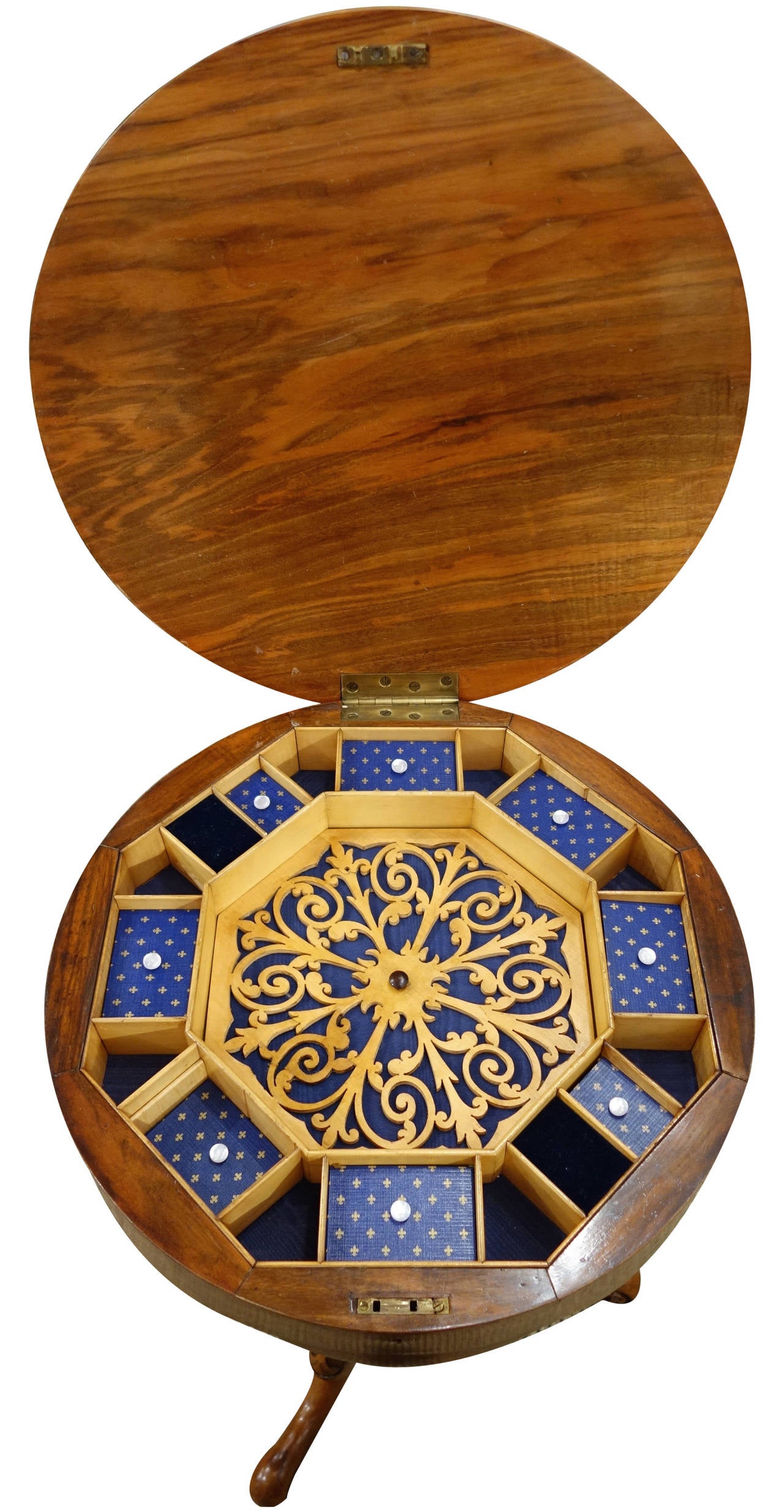 19th century continental table with beautiful fretwork on the interior.