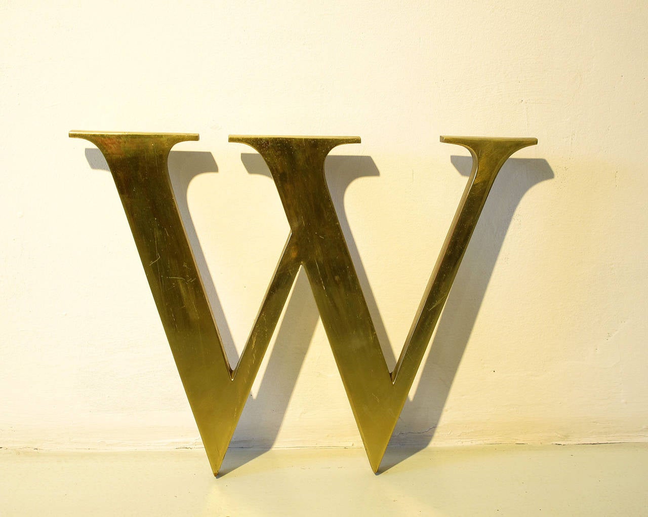 Rare solid brass letter 