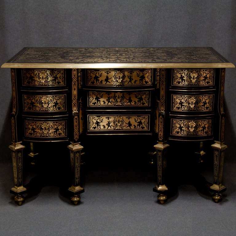 End of 17th century.  Veneered in ebony.  Very fine copper marquetry, with patterns of dancing figures, apes, parrots, angels, falconers etc.  Boulle technique.  Very important art piece.  Excellent condition.