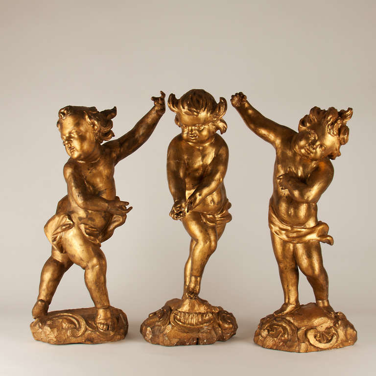 Gilded Wooden putti's.  circa 1680-1720 Germany
Good condition. 
few age marks.