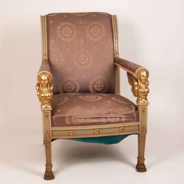 Pair of 19th century Italian armchairs.  
The feet of the chair are made ​​of bronze. 
 Empire style, originally gilded. 
 Good condition.