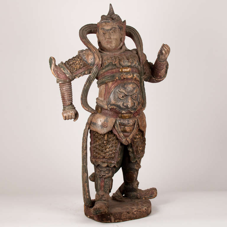 Beautifully carved polychromed wooden warrior.
18th century or earlier, China.
Very good condition, wear consistent with age.
The eyes are of glass.