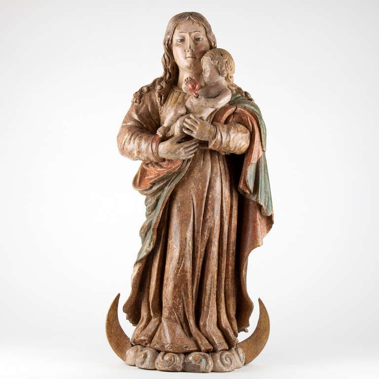 Beautifully carved madonna with child standing on a crescent.
Portugal, circa 1600.
Original polychrome.
Very high quality and a very good condition, wear consistent with age.