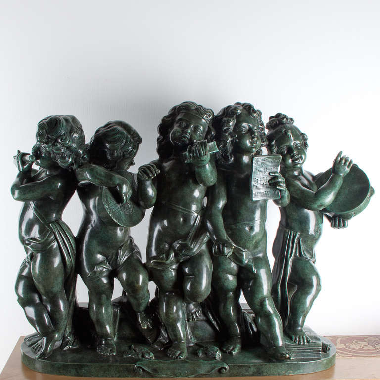 A bronze group depicting puttis making music signed by clodion, circa 1900.
Foundry stamp by Cire perdue,Valsuani.
Beautiful patina and quality,
Excellent condition.
