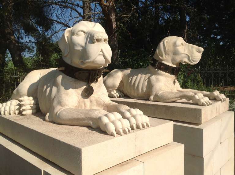 Handed Pair of Cast Stone Roman Dogs on Plinths