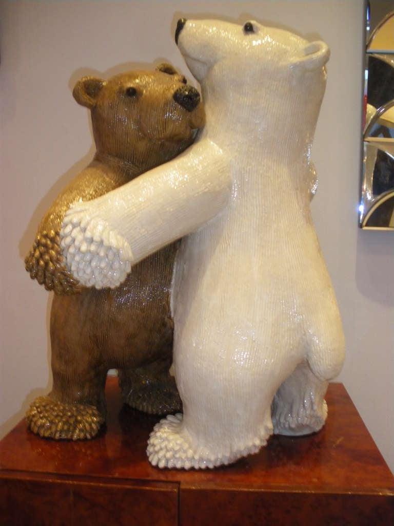Beautiful and large sandstone and enameled ceramic sculpture representing a couple of dancing bears.Unique piece. Weight: 50kg. Signed Valerie Courtet. A certificate of authenticity will be given to the buyer.